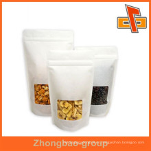 Embalaje de alimentos proveedor guangzhou stand up bolsa de papel de arroz con cremallera y ventana para bocadillos